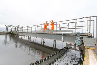 Veolia engineers working at a wastewater treatment plant Veolia engineers working at a wastewater treatment plant