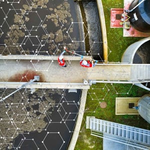Engineers working at a digitally enhanced wastewater treatment plant Engineers working at a digitally enhanced wastewater treatment plant